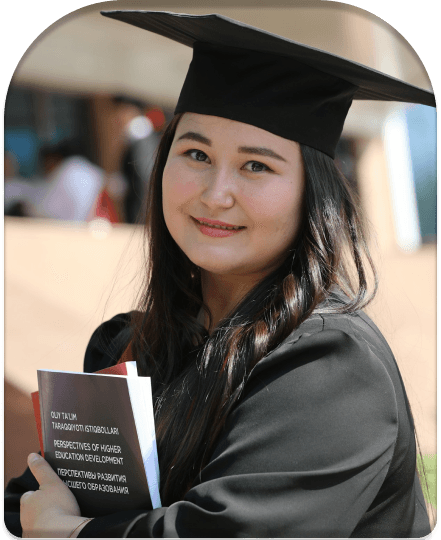 Graduate in cap and gown holding a diploma