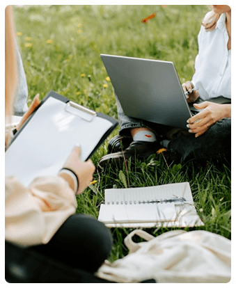Learners studying together outdoors
